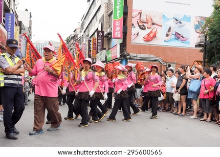 TAMSUI,TAIWAN- June 21:The folk-custom acrobatics in the temple fair of township on June 21,2015 in Tamsui,Taipei,Taiwan. The fair held annually for honor of the Ching-Shui Master.