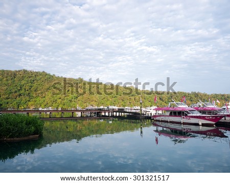 SUN MOON LAKE,TAIWAN - JUNE 7: many boats parking at the pier on June 7, 2015 at Sun Moon Lake, Taiwan. Sun Moon Lake is the largest body of water in Taiwan as well as a tourist attraction.