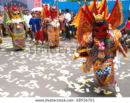 TAMSUI,TAIWAN - JUNE 23 : The Folk-Custom AcroBatics in the temple fair of  Tamsui township on June 23,2010  in  Tamsui,Taipei, Taiwan. The fair held   annually on Chinese Lunar date of sixth May.