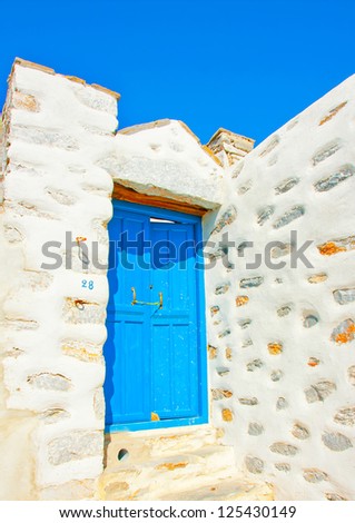 A beautiful blue colored door of a traditional old house in Chora the capital of Amorgos island in Greece