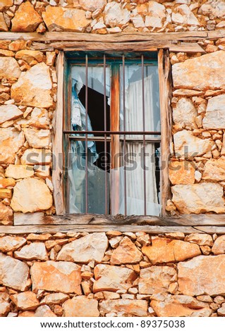 Window in an old house in the village Psarades near lake Prespa in Northern Greece