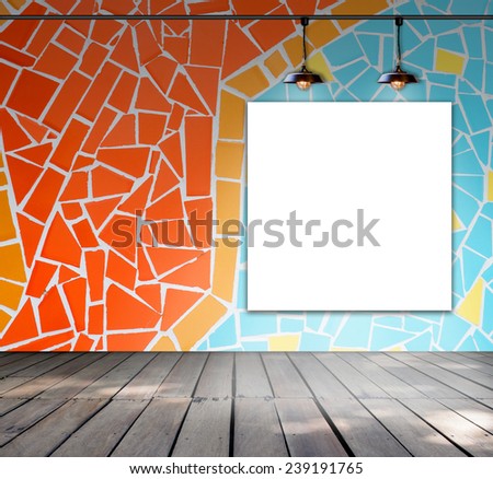 Blank frame on mosaic tile wall with Ceiling lamp for information message