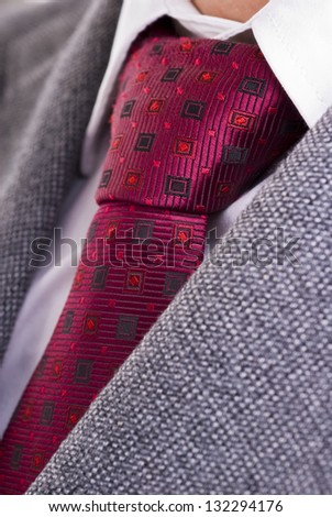 Closeup of formal business attire with necktie, shirt and jacket