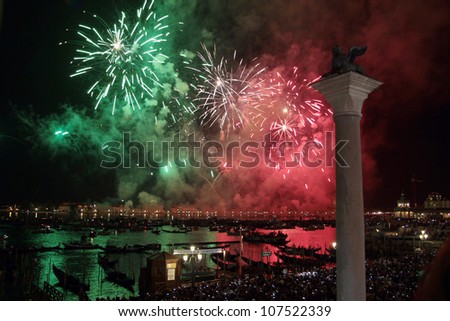 VENICE, ITALY - JULY 14:Fireworks over water during the celebrations of Redentore in Venice on jULY 14, 2011 in Venice, Italy.