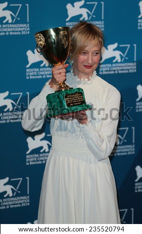 VENICE, ITALY - SEPTEMBER 06: Alba Rohrwacher with her Best Actress award during the award winners photocall during the 71st Venice Film Festival on September 06, 2014 in Venice, Italy