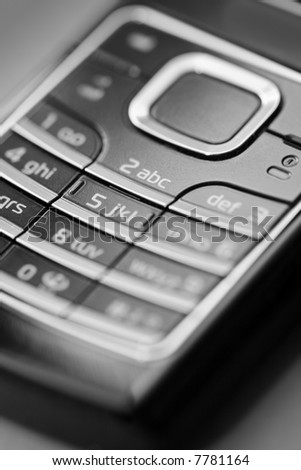 Monochromatic image of the keypad of a cell phone. short depth of field.