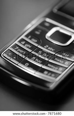 Keypad of a GSM/UMTS cell phone. Short depth-of-field. Black and White image.