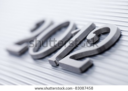 2012 presented with metal letters.