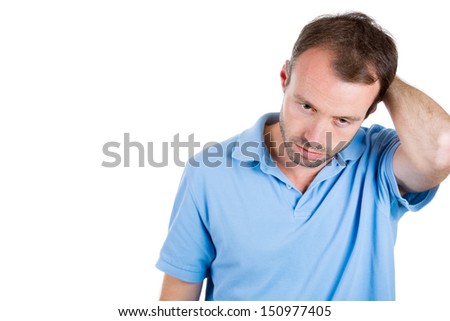 Closeup portrait of a very sad, depressed, alone, disappointed man with hand on back of head, isolated on white background with copy space