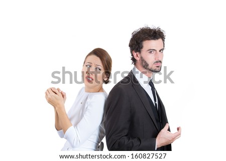 Closeup portrait of two people, couple woman and man, back to back, very sad, disappointed with each other, isolated on white background. Marriage, relationship problems. Human emotions, expressions