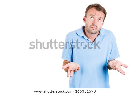 Closeup portrait of dumb clueless young man, arms out asking what's the problem who cares so what, I don't know. Isolated on white background, space to left. Negative human emotion facial expression Foto stock © 