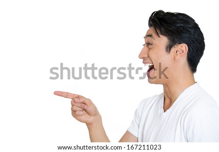 Closeup Side View Portrait Of Young Man, Laughing, Pointing With Finger ...