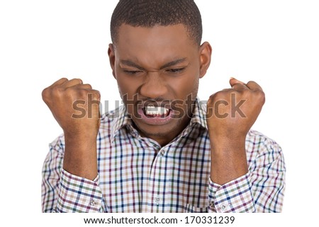 Closeup portrait of angry, pissed off, irritated guy, student, worker squeezing his fists, screaming, looking mad, isolated on white background. Negative human emotions, facial expressions, feelings