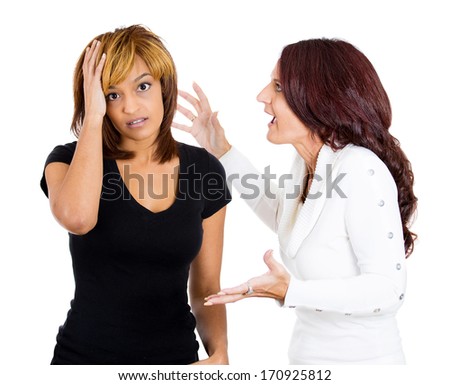 Closeup portrait of mad woman nagging complaining to other lady who is getting pissed off annoyed, isolated on white background. Negative emotion facial expression feelings. Interpersonal conflict
