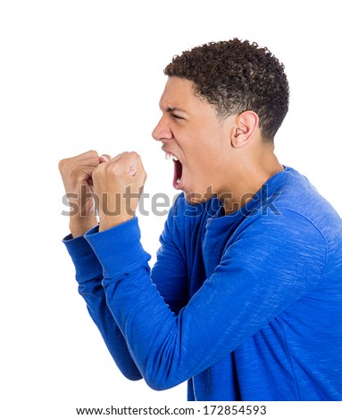 Closeup, side view profile portrait of angry man with fists in air, wide open mouth yelling, isolated on white background. Negative emotion, facial expression feelings. Conflict scandal problems