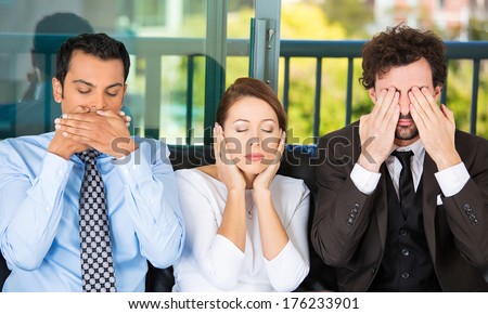 Closeup portrait of three business people on black couch imitating see no evil, hear no evil, speak no evil concept, isolated on city urban background. Human emotions, expressions and communication