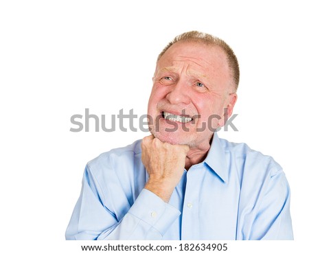 Closeup portrait of senior mature, unhappy man very sad in deep thought thinking of something that worries him, isolated on white background. Negative human emotions. Face expressions.