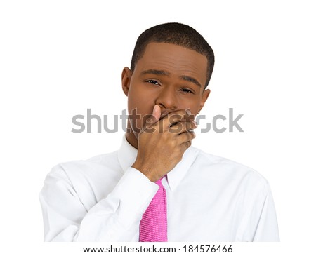 Closeup portrait, sleepy guy, bored young man, tired student placing hand on mouth yawning, eyes closed, isolated white background. Human emotions, facial expressions, feelings, body language