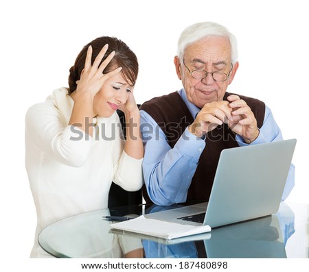 Closeup portrait young, technology savvy, frustrated woman, showing confused, senior, older, elderly man with eyeglasses how use laptop isolated white background. Generation gap differences concept