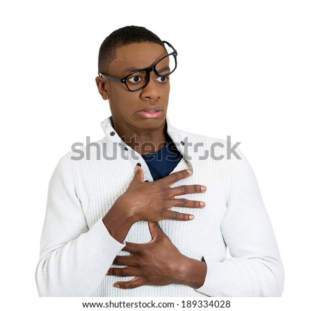 Closeup portrait, truly stunned nerd young man, big glasses messed up on head, eyes wide open, looking away, isolated white background. Negative human emotion facial expression feelings