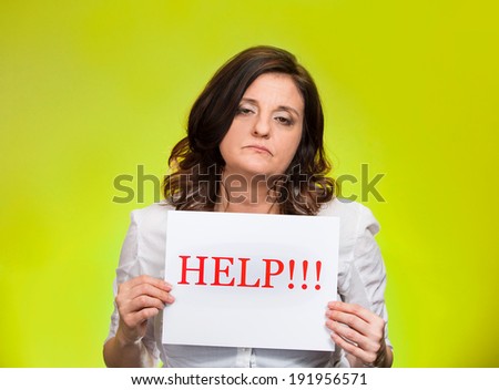 Closeup portrait stressed overwhelmed, asking, young woman, student, worker, holding help sign isolated green background. Negative human emotion, face expression, feelings, reaction, life perception