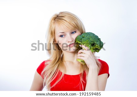 Similar – Foto Bild Skeptisches Mädchen isst Obst im Garten