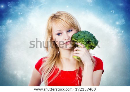 Similar – Foto Bild Skeptisches Mädchen isst Obst im Garten