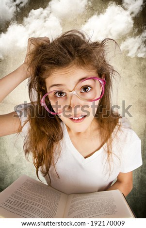 Closeup portrait confused, stressed tired, overwhelmed funny little girl with messed up hair, holding book having multiple unanswered questions isolated clouds background. Facial expression, emotion