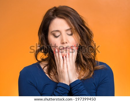 Closeup portrait young, stressed woman having so many thoughts, worried about future, thinking, isolated orange background. Human facial expressions, feelings, emotions, attitude, life perception