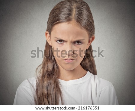 Closeup portrait Angry young Girl about to have Nervous atomic breakdown displeased isolated grey wall background. Negative human emotions Facial Expression feeling attitude reaction body language