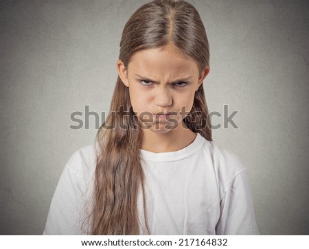 Angry. Closeup portrait young girl having nervous breakdown isolated grey wall background. Negative human emotions facial expressions feelings, bad attitude, body language, reaction, life perception