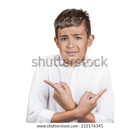Closeup portrait confused young man pointing in two different directions unsure which way to go life hesitant to make decision isolated white background. Emotion face expression feeling body language