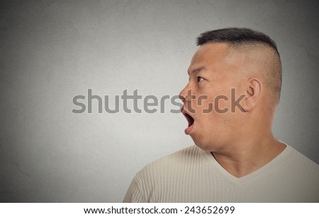 Side profile middle aged man speaking