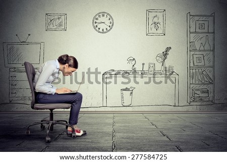 Side profile young corporate businesswoman executive working on laptop in office sitting on chair. Technology education concept