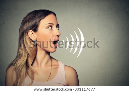 Side profile of beautiful girl with her mouth open