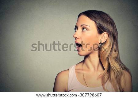 Closeup side view profile portrait woman talking with sound coming out of her open mouth isolated grey wall background. Human face expression emotions. Communication, information, intelligence concept
