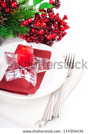 Christmas table layout, multi-colored tape with a branch of berries