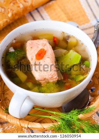 Fish a trout soup and bread with fennel