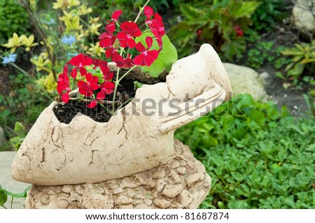 Flower in a ceramic jug, beautiful landscape design
