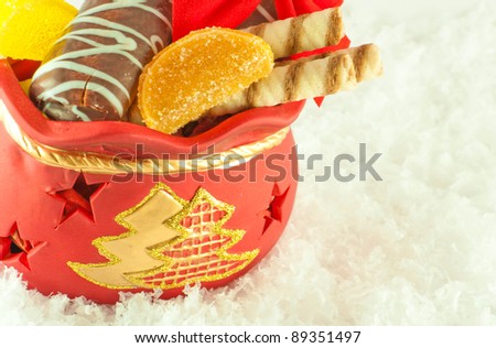 Christmas bag with gifts, cookies and fruit candy, a gift