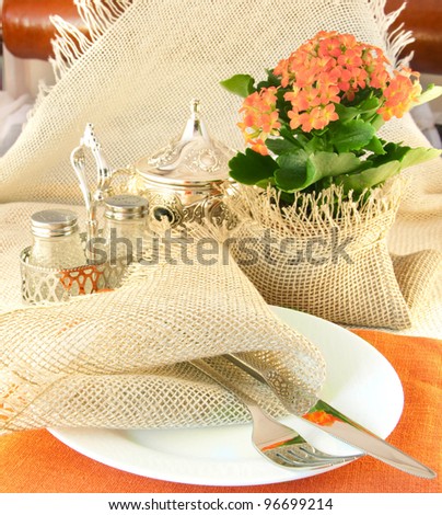 Table layout by table silver and natural flowers