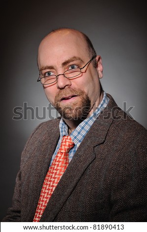 College Professor with a tweed coat and an orange tie over a gray background