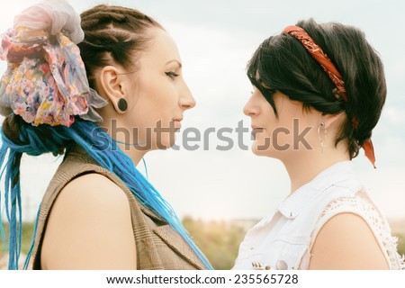 young girls of the competitor look each other in face