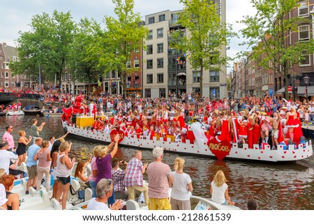 Amsterdam, Netherlands - August 2, 2014: Participants at Canal Parade of  Amsterdam Gay Pride 2014 in Amsterdam. The parade is one of the biggest public events in the Netherlands.