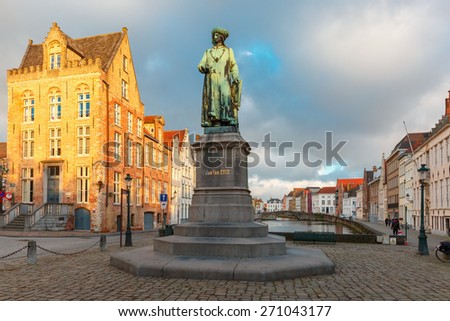 Monument of famous artist Jan Van Eyck on Square Jan van Eyckplein in Bruges, Belgium