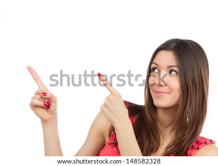 Portrait of young woman pointing hands finger at corner with copyspace isolated on a white background