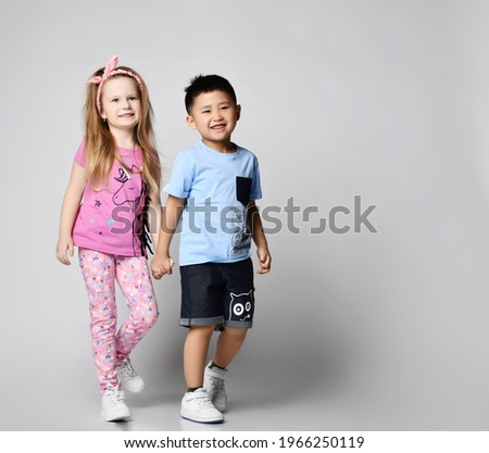 Similar – Image, Stock Photo Two little kids having fun in summer
