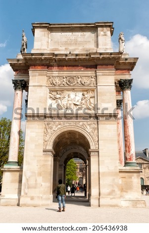 PARIS, FRANCE - MARCH 27: Arch Triumph Carousel on March 27, 2014. Triumphal arch in Paris, located in the Carrousel Square on the site of the former Tuileries Palace.
