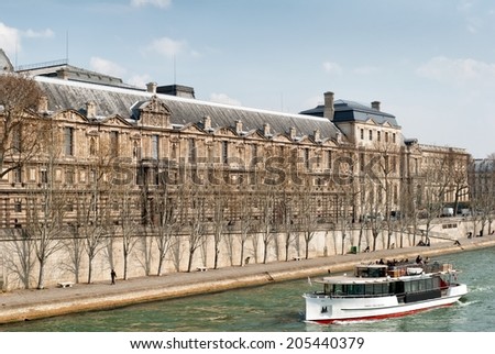 PARIS, FRANCE - MARCH 27: Louvre museum, detail on March 27, 2014 in Paris. The museum is housed in the Louvre Palace, originally built as a fortress in the late 12th century under Philip II.
