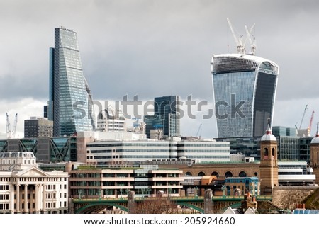 LONDON - MARCH 23: City of London on March 23, 2014. The City is a tiny part of the metropolis of the London region. It holds city status in its own right and is also a separate ceremonial county.
